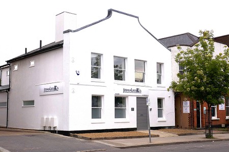 white office building with sort of gable - what do you call this?