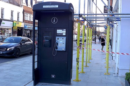 Black telephone box with no door
