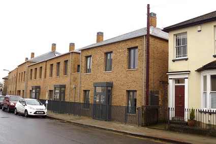 two storey terraced houses, yellow brick