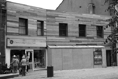 Shop with cladding