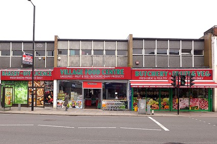 shop with fruit and vegetables outside